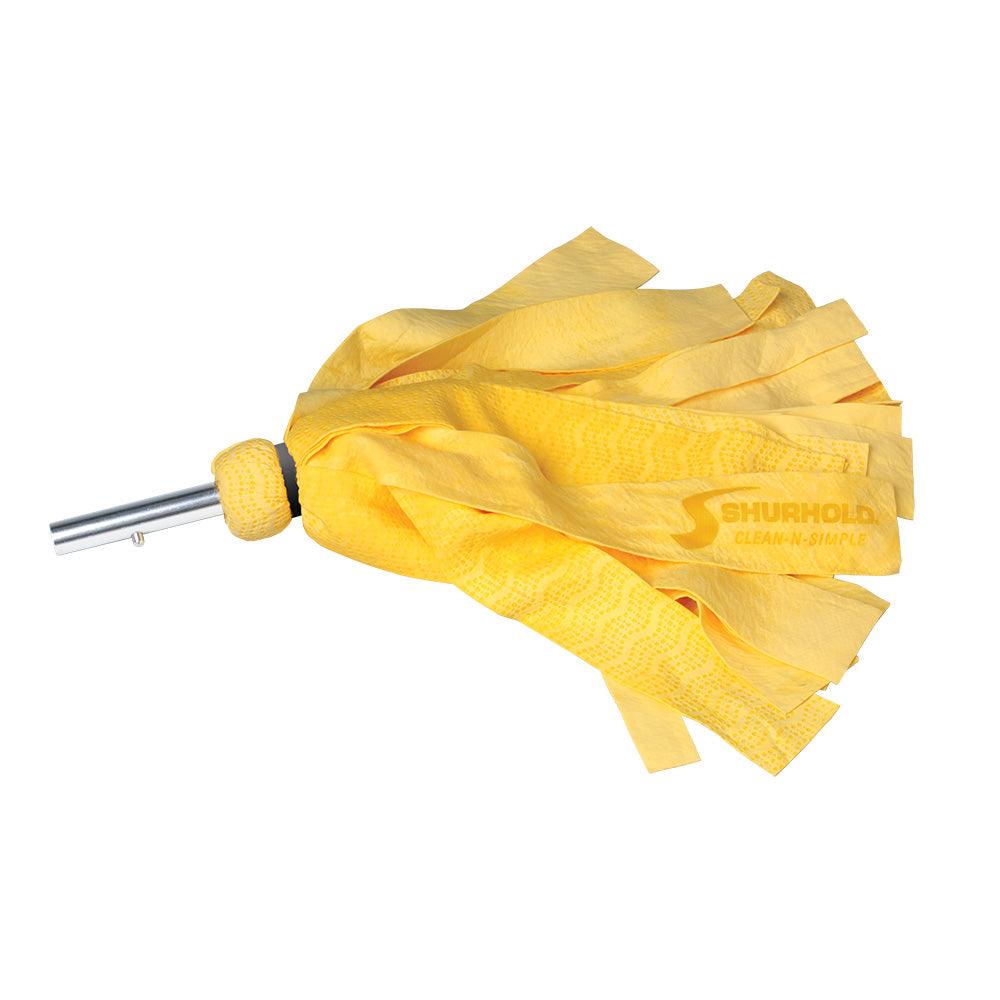 a yellow umbrella is on a white surface 