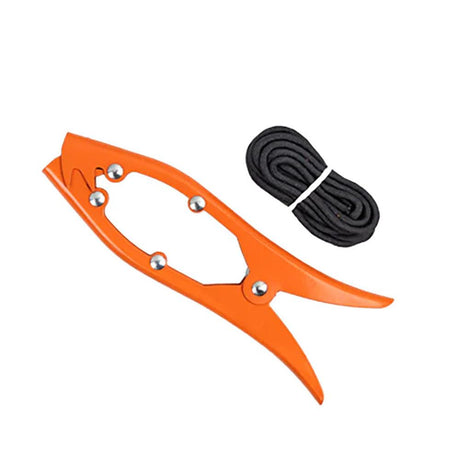 a pair of orange scissors sitting on top of a table 